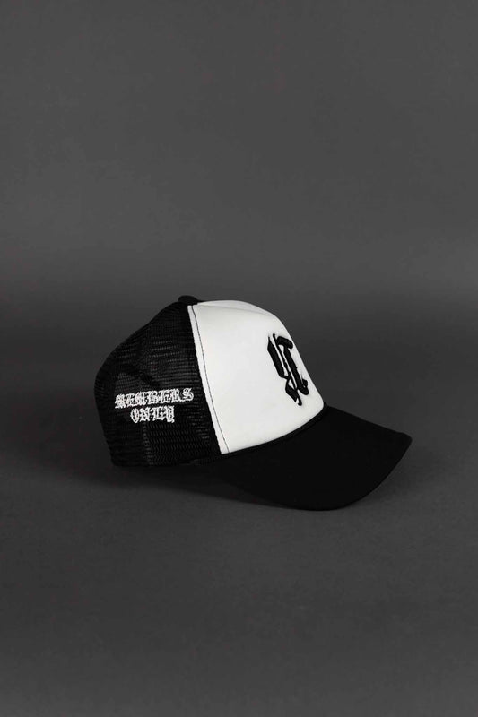 REBELETICS REVERSED "R" TRUCKER HAT - BLACK/WHITE